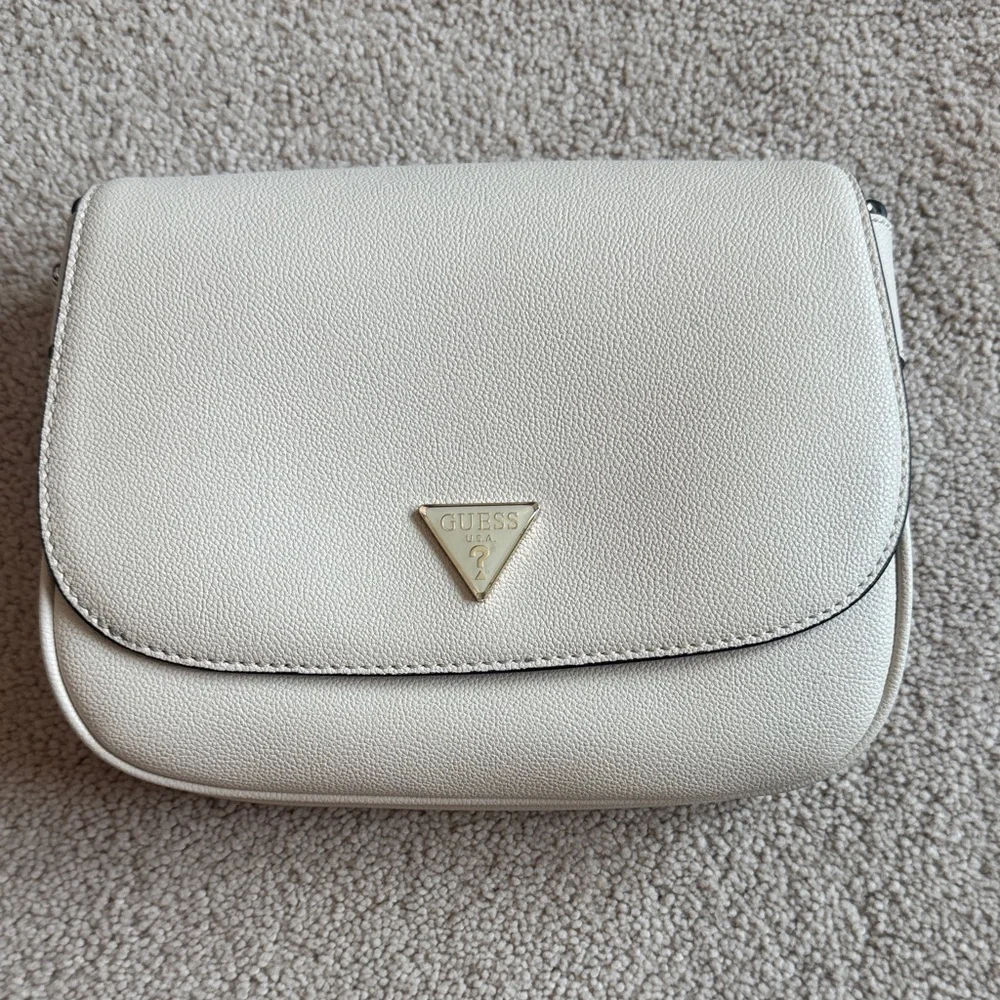 GUESS Cream Pebbled Leather Crossbody with Gold Triangle Logo